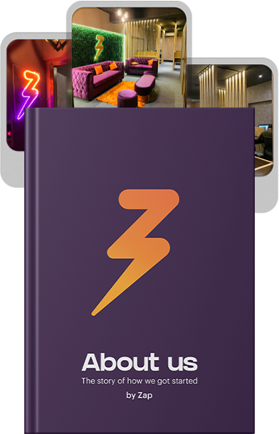 A note book with the Zap Media logo and a heading written on it says about us: "the story of how we got started."